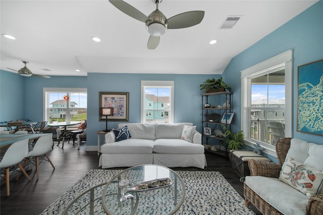 26711 Bay Water Dr, Galveston, TX 77554 - living area with plenty of natural light, visible vents, a ceiling fan, and wood finished floors