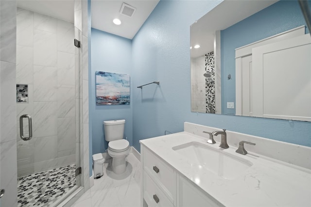 26711 Bay Water Dr, Galveston, TX 77554 - full bath featuring visible vents, baseboards, toilet, a shower stall, and vanity