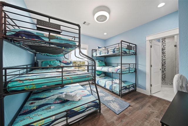 26711 Bay Water Dr, Galveston, TX 77554 - bedroom featuring wood finished floors, baseboards, visible vents, and recessed lighting