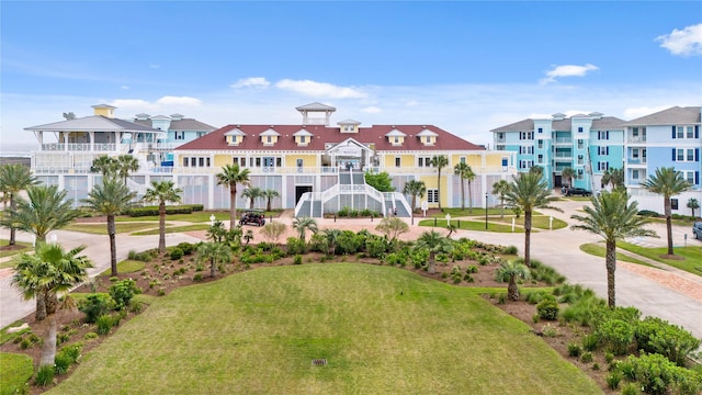 26711 Bay Water Dr, Galveston, TX 77554 - surrounding community with a yard and a residential view