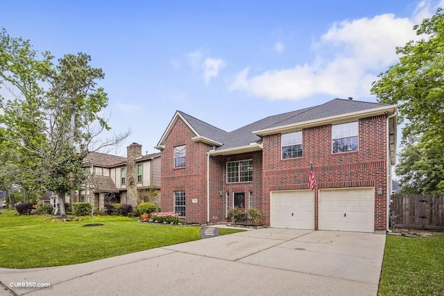 view of front of property with driveway, an attached garage, a front yard, brick siding, and fence