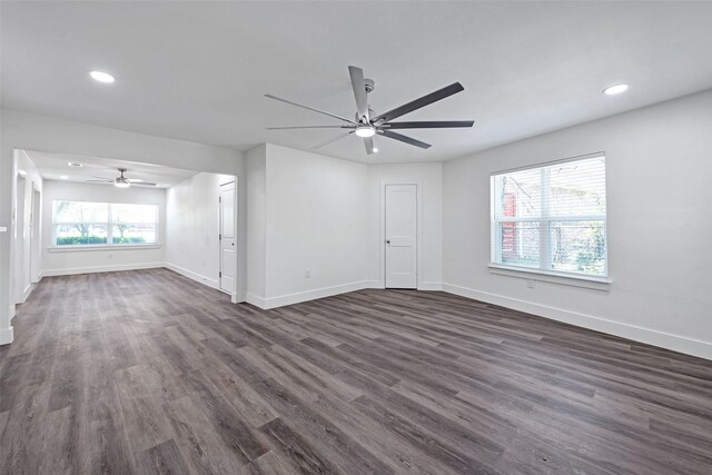 4074 Cheena Dr, Houston, TX 77025 - empty room with a ceiling fan, baseboards, dark wood-type flooring, and recessed lighting