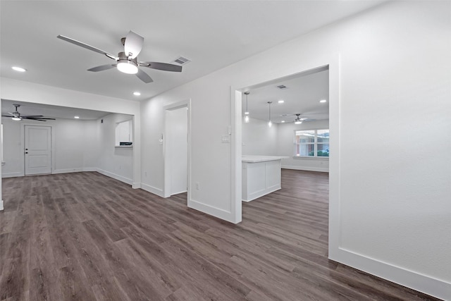 4074 Cheena Dr, Houston, TX 77025 - unfurnished living room featuring a ceiling fan, dark wood finished floors, recessed lighting, and baseboards