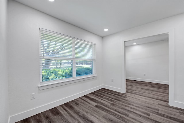 4074 Cheena Dr, Houston, TX 77025 - spare room with dark wood-type flooring, baseboards, and recessed lighting
