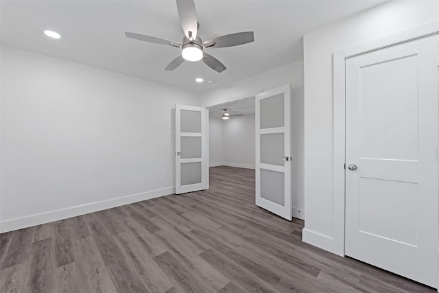 4074 Cheena Dr, Houston, TX 77025 - unfurnished bedroom featuring wood finished floors, recessed lighting, baseboards, and ceiling fan