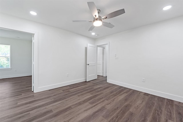 4074 Cheena Dr, Houston, TX 77025 - empty room featuring dark wood finished floors, a ceiling fan, baseboards, and recessed lighting