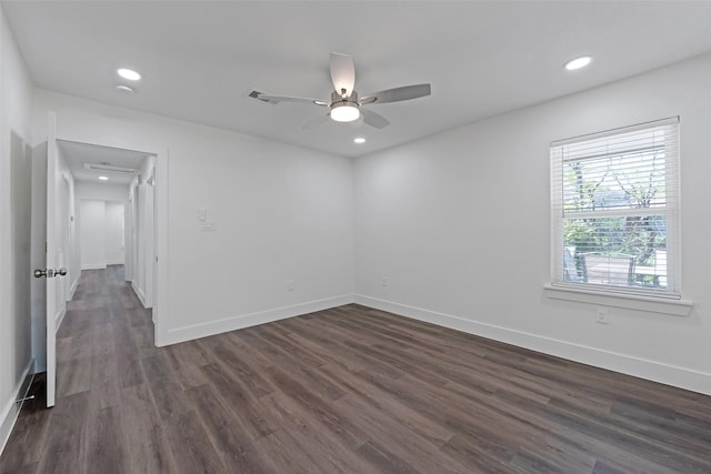 4074 Cheena Dr, Houston, TX 77025 - spare room featuring dark wood-style floors, ceiling fan, baseboards, recessed lighting, and attic access
