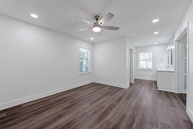 4074 Cheena Dr, Houston, TX 77025 - spare room with a ceiling fan, dark wood-type flooring, recessed lighting, and baseboards