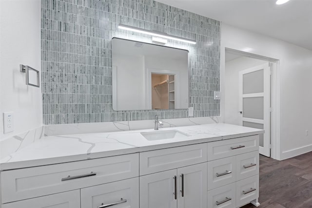 4074 Cheena Dr, Houston, TX 77025 - bathroom with vanity, wood finished floors, and tile walls