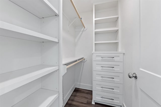 4074 Cheena Dr, Houston, TX 77025 - walk in closet with dark wood-style floors