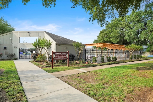 view of building exterior with fence