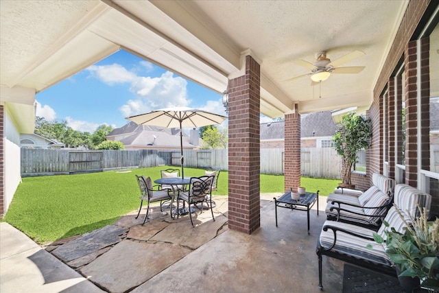 1314 Cross Valley Dr, Sugar Land, TX 77479 - view of patio / terrace with ceiling fan and outdoor dining area