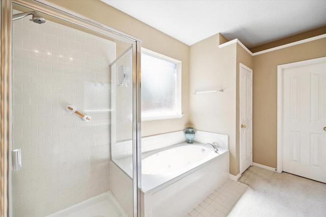 1314 Cross Valley Dr, Sugar Land, TX 77479 - full bathroom featuring a stall shower, a garden tub, and baseboards