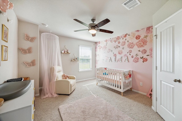 23531 Montague Dr, Spring, TX 77373 - carpeted bedroom featuring a nursery area, a ceiling fan, and baseboards