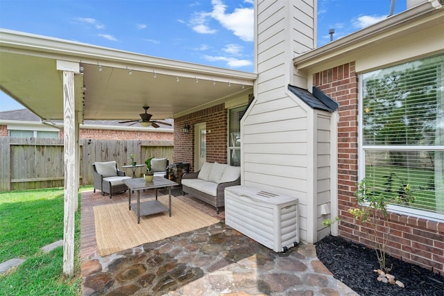 9330 Vander Rock Dr, Houston, TX 77095 - view of patio featuring fence, a ceiling fan, and an outdoor hangout area