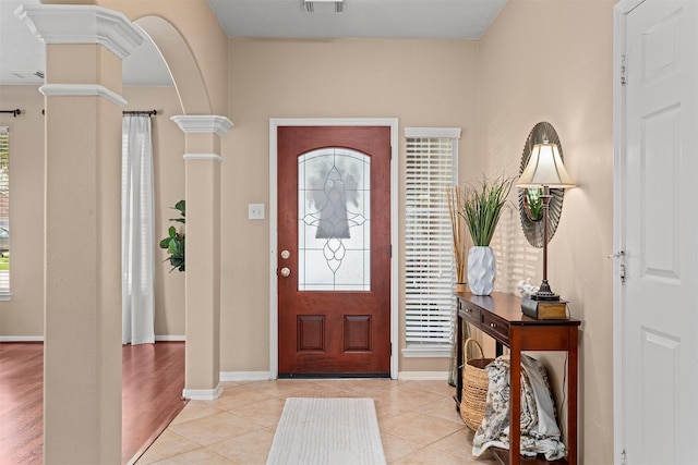 9330 Vander Rock Dr, Houston, TX 77095 - entryway with ornate columns, visible vents, plenty of natural light, and baseboards