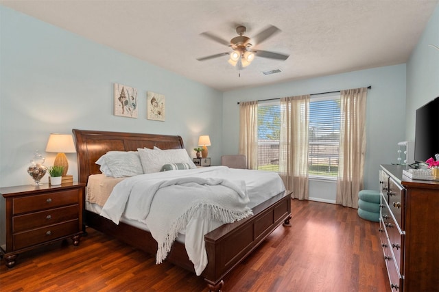 9330 Vander Rock Dr, Houston, TX 77095 - bedroom with a ceiling fan, visible vents, and dark wood finished floors