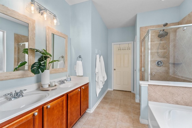 9330 Vander Rock Dr, Houston, TX 77095 - full bath with a stall shower, tile patterned flooring, double vanity, and a sink