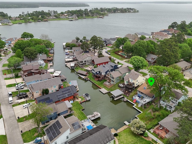 215 Clear Water St E, Montgomery, TX 77356 - aerial view of residential area featuring a large body of water