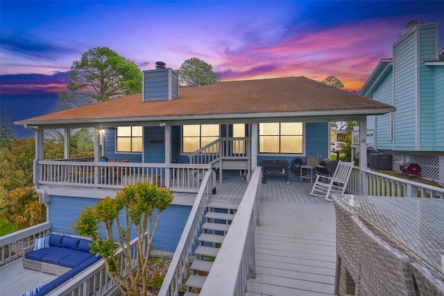 215 Clear Water St E, Montgomery, TX 77356 - deck at dusk with stairway