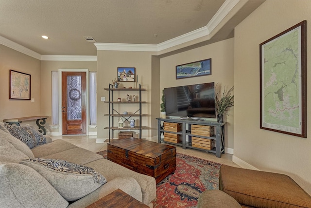 343 Old Aqua Lndg E, Conroe, TX 77356 - living room featuring light tile patterned floors, ornamental molding, baseboards, and visible vents