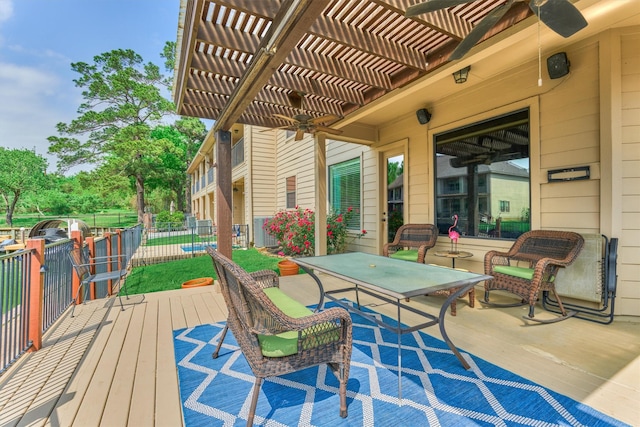 343 Old Aqua Lndg E, Conroe, TX 77356 - wooden deck with ceiling fan, a pergola, fence, and outdoor dining space