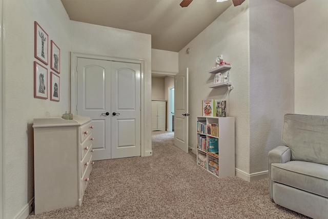 343 Old Aqua Lndg E, Conroe, TX 77356 - sitting room with baseboards, carpet flooring, and a ceiling fan