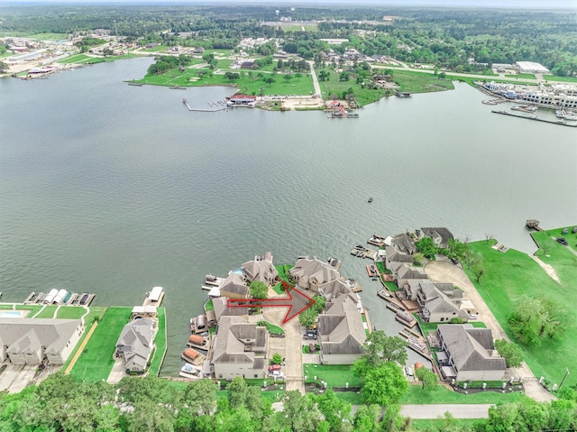 343 Old Aqua Lndg E, Conroe, TX 77356 - drone / aerial view with a residential view and a water view