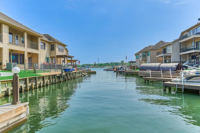 343 Old Aqua Lndg E, Conroe, TX 77356 - view of dock featuring a water view and central air condition unit
