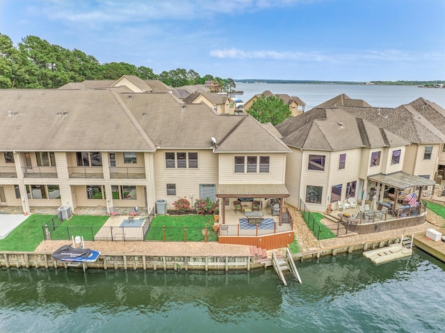 343 Old Aqua Lndg E, Conroe, TX 77356 - bird's eye view with a residential view and a water view