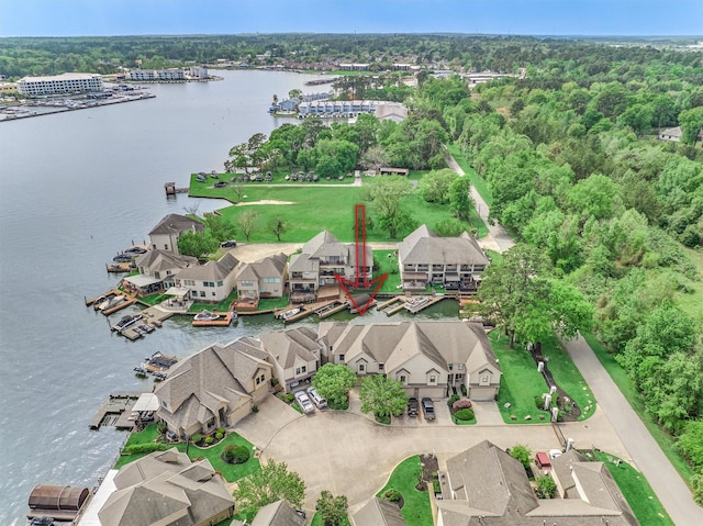 343 Old Aqua Lndg E, Conroe, TX 77356 - drone / aerial view featuring a residential view and a water view
