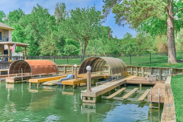 343 Old Aqua Lndg E, Conroe, TX 77356 - view of dock with a water view and fence