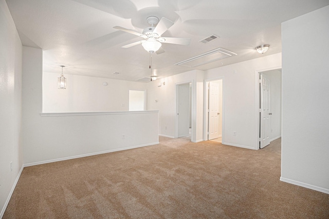 2522 Barton Springs St, League City, TX 77573 - spare room with attic access, carpet, baseboards, and ceiling fan