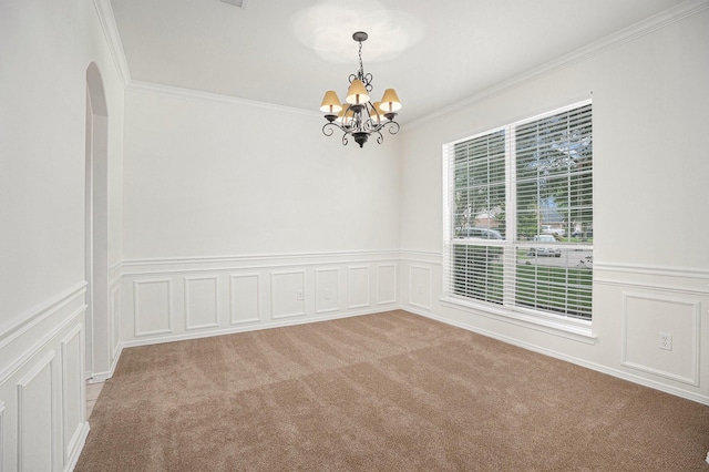 2522 Barton Springs St, League City, TX 77573 - unfurnished room featuring a chandelier, a decorative wall, crown molding, carpet floors, and wainscoting