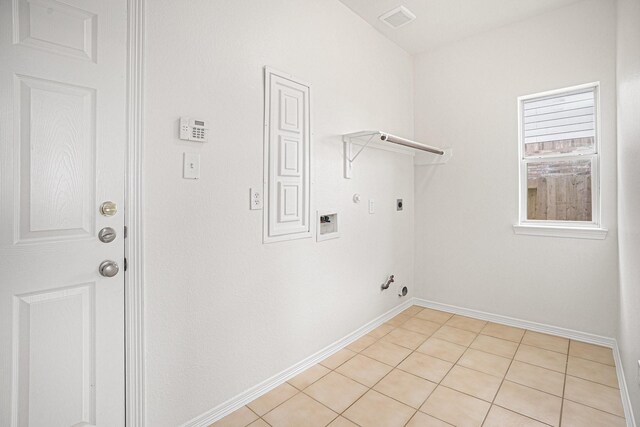 2522 Barton Springs St, League City, TX 77573 - laundry area featuring gas dryer hookup, electric dryer hookup, baseboards, and hookup for a washing machine