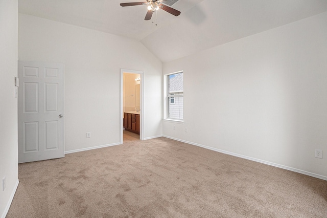 2522 Barton Springs St, League City, TX 77573 - unfurnished bedroom with light carpet, vaulted ceiling, baseboards, ensuite bath, and a ceiling fan