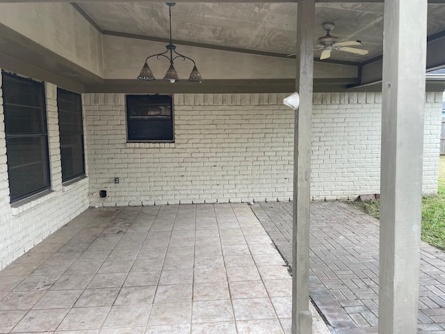 view of patio featuring a ceiling fan