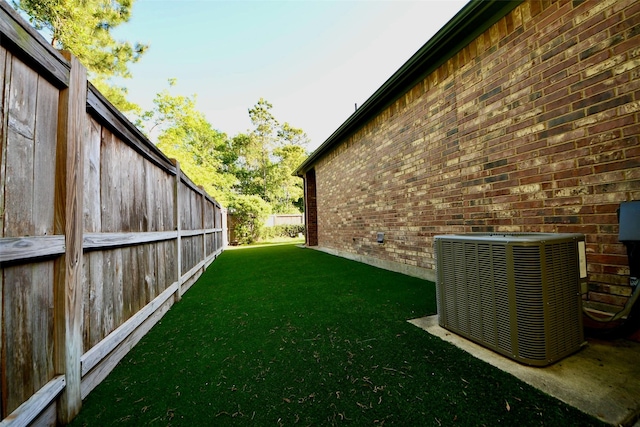 3507 Manor Lake Ln, Spring, TX 77386 - view of yard featuring central AC unit and fence
