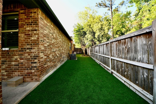 3507 Manor Lake Ln, Spring, TX 77386 - view of yard with a fenced backyard and cooling unit