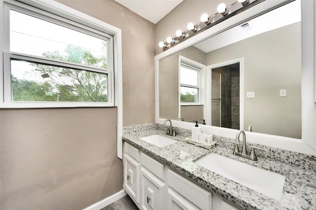 full bath with a sink, visible vents, and a healthy amount of sunlight