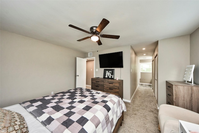 bedroom featuring visible vents, a ceiling fan, recessed lighting, and light carpet