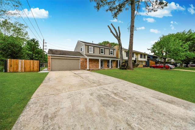 view of front of house with fence, a front yard, brick siding, concrete driveway, and an attached garage