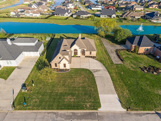 10904 Dauphine St, Willis, TX 77318 - aerial view featuring a residential view and a water view
