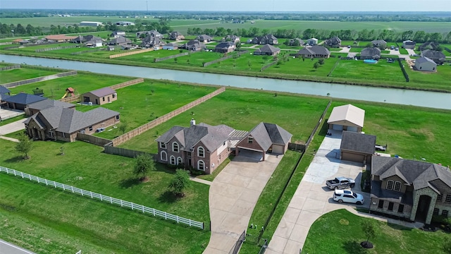 aerial view with a water view and a residential view