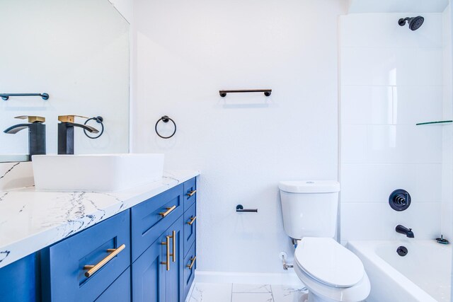 6714 Scott St, Liverpool, TX 77577 - bathroom with shower / washtub combination, vanity, toilet, marble finish floor, and baseboards
