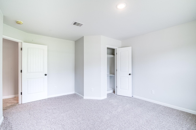 6714 Scott St, Liverpool, TX 77577 - unfurnished bedroom with visible vents, baseboards, and carpet floors