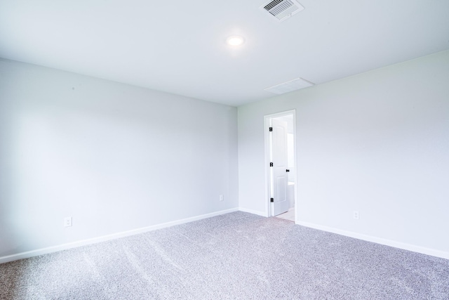 6714 Scott St, Liverpool, TX 77577 - empty room featuring light carpet, visible vents, and baseboards