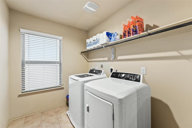 laundry room with separate washer and dryer, laundry area, and visible vents