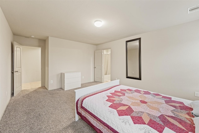 carpeted bedroom with visible vents