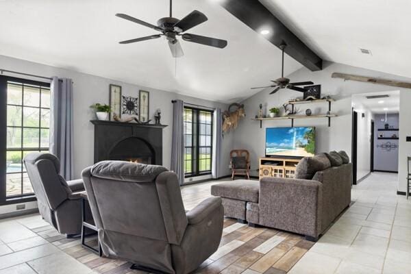 1760 County Road 965, Alvin, TX 77511 - living area with ceiling fan and a lit fireplace